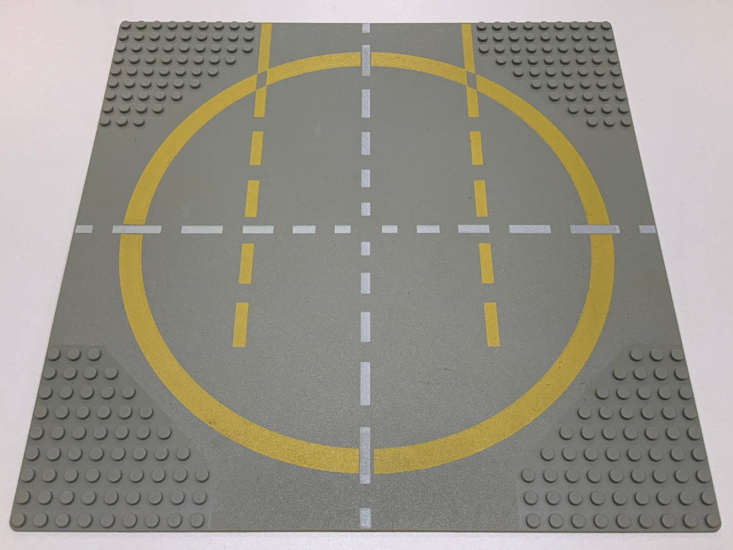 32x32 Road Baseplate 9-Stud Landing Pad with Yellow Circle, 1-way Lines Pattern, Part# 6099px2
